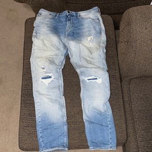 Distressed denim jeans